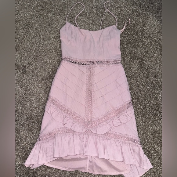 Walk This Way Pintuck Ruffle Detail Dress Blush
US 8 - Picture 2 of 9